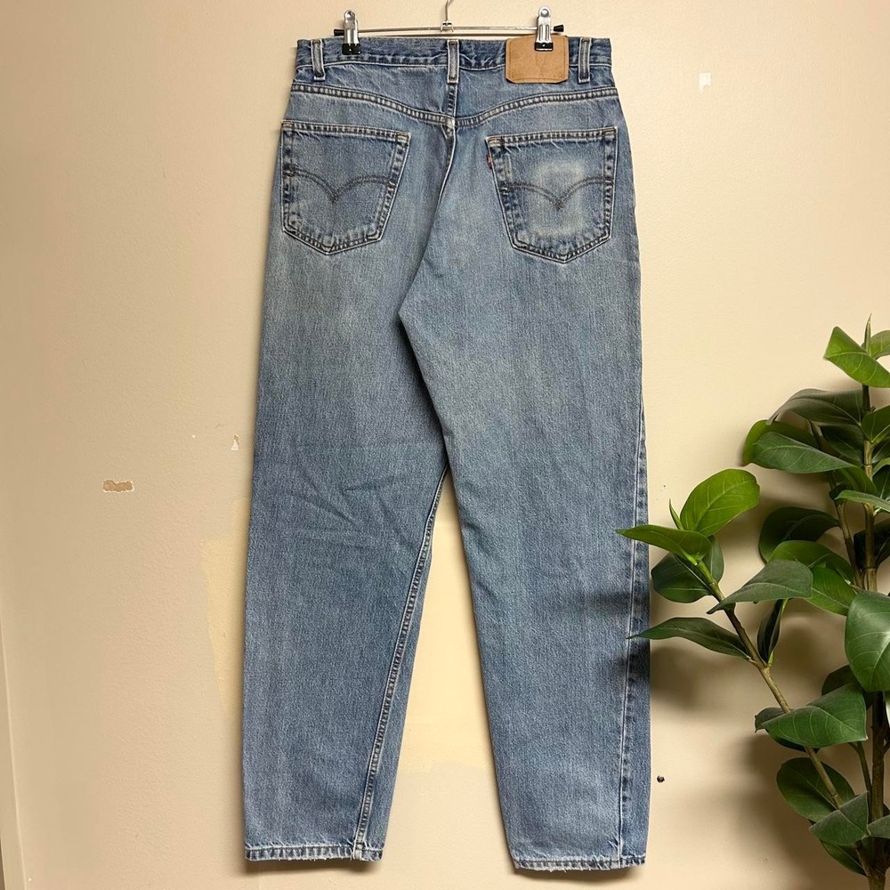 Vintage 90s Levis 550 Faded Blue Baggy Jeans 32x33 Relaxed Fit Tapered Leg